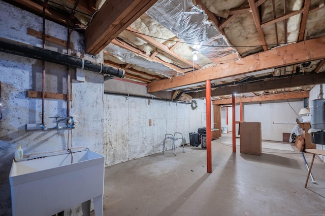 unfinished basement with a sink