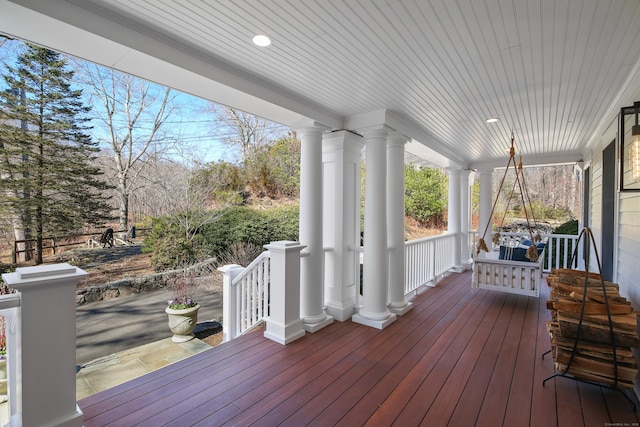 wooden deck featuring covered porch