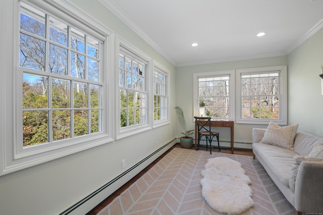 sunroom / solarium featuring baseboard heating