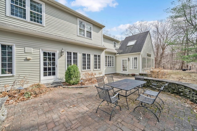 back of house featuring a patio