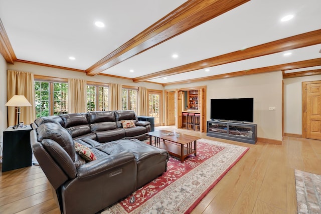 living room featuring recessed lighting, beamed ceiling, baseboards, and light wood-style floors