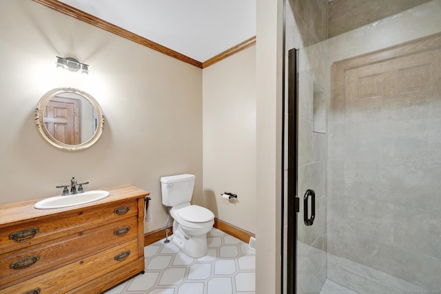 full bath featuring vanity, baseboards, ornamental molding, a shower stall, and toilet