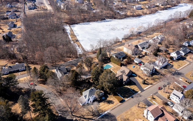 birds eye view of property with a residential view