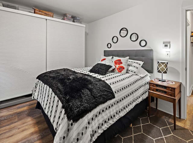 bedroom featuring wood finished floors