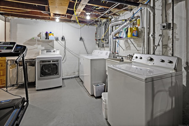 laundry room featuring laundry area and washing machine and clothes dryer