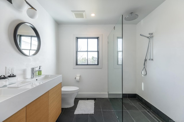 full bath featuring a shower, toilet, baseboards, tile patterned floors, and visible vents