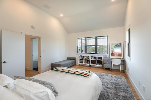 bedroom with recessed lighting, baseboards, light wood-style floors, and visible vents