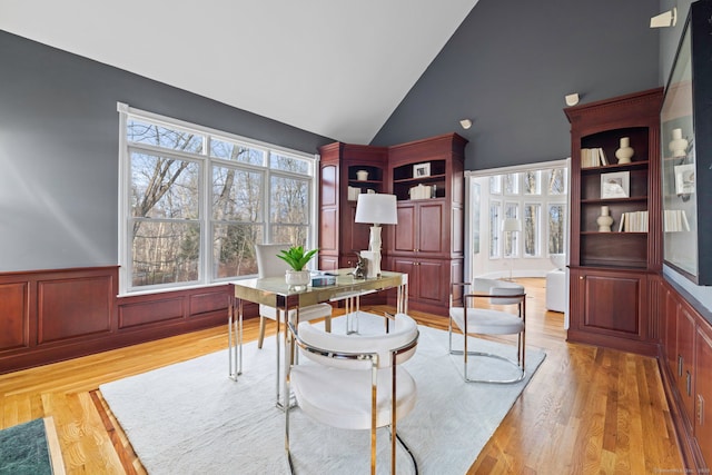 215 Paddock Hill Ln, Fairfield, CT 06824 - home office with light wood-style flooring, a wainscoted wall, and high vaulted ceiling