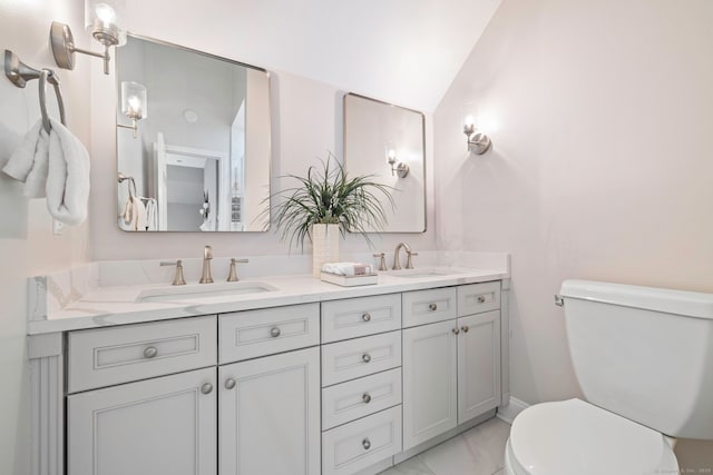 215 Paddock Hill Ln, Fairfield, CT 06824 - bathroom with toilet, marble look tiles, and double vanity