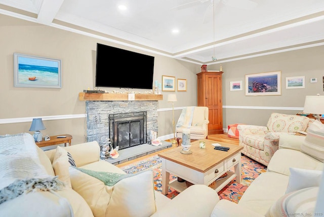 living area featuring ceiling fan, recessed lighting, a fireplace, and ornamental molding