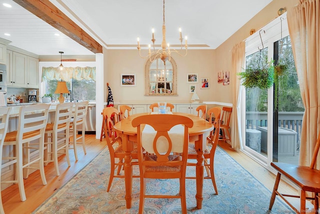 dining space with light wood-style flooring, recessed lighting, ornamental molding, beamed ceiling, and a notable chandelier