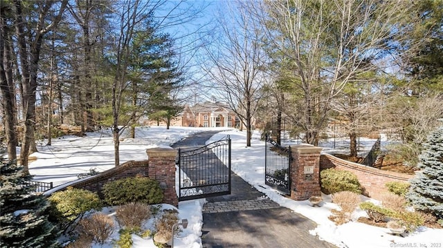 23 Robkins Rd, Avon, CT 06001 - exterior space featuring driveway and a gate