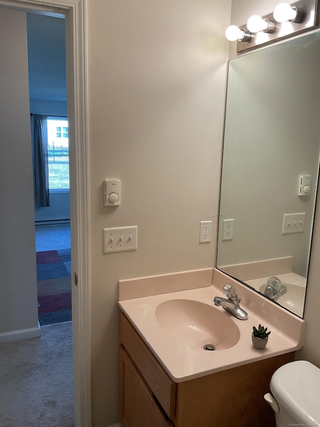 half bath with toilet and vanity