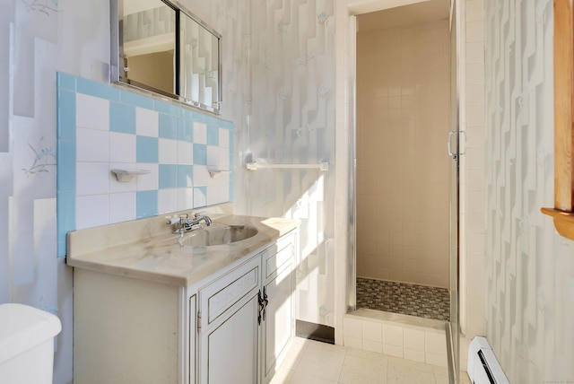 bathroom with wallpapered walls, a baseboard radiator, a stall shower, and tile patterned flooring