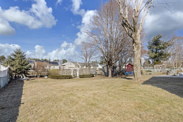 view of yard featuring fence