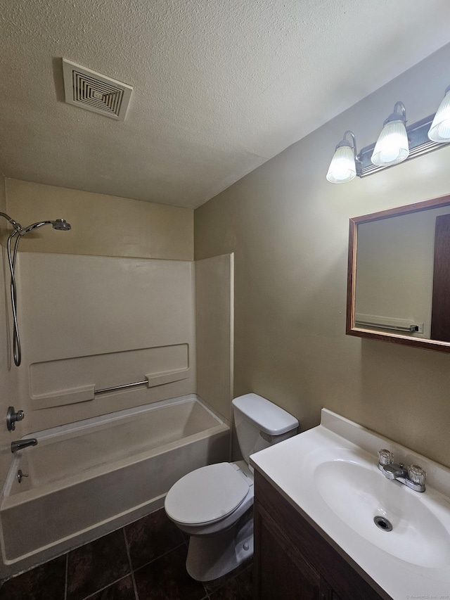 bathroom with vanity, toilet, visible vents, and shower / bathtub combination