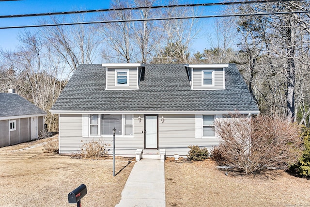 view of front of property with a shingled roof