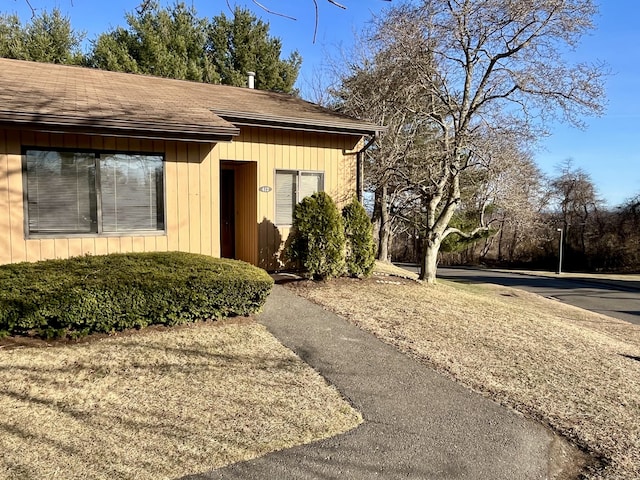 view of front of home featuring a shingled roof