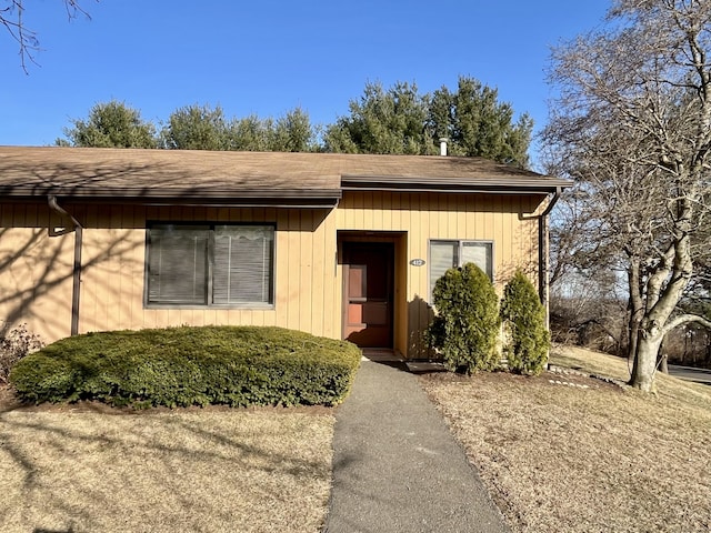 view of front of home featuring a shingled roof