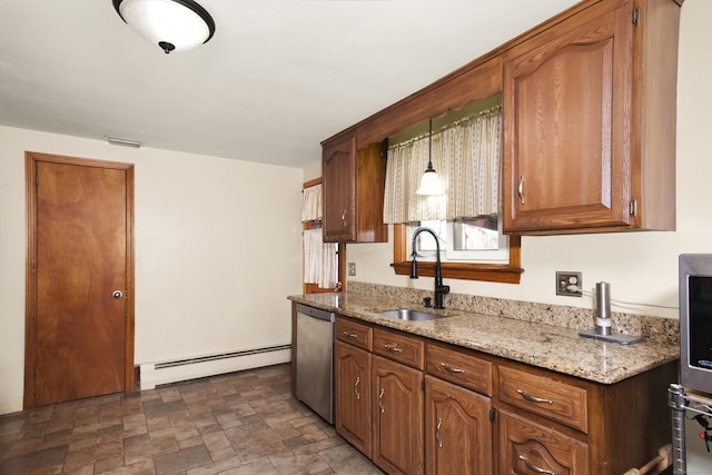 kitchen with light stone counters, a sink, stone finish floor, dishwasher, and baseboard heating