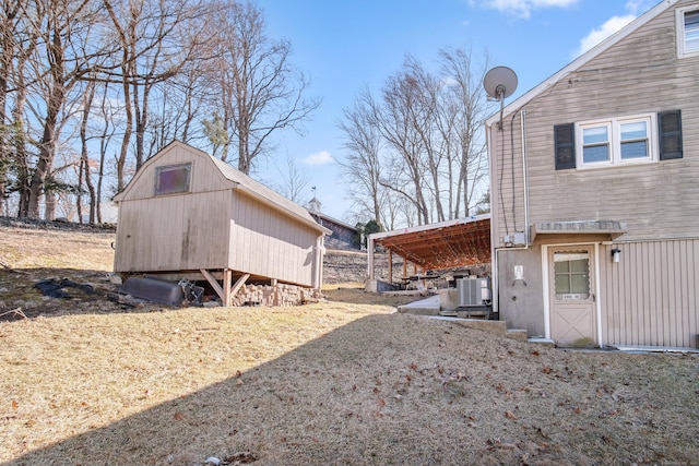 view of yard with an outbuilding and cooling unit