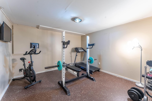 exercise room with baseboards