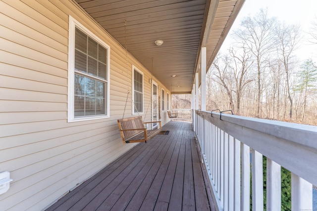 wooden terrace featuring a porch