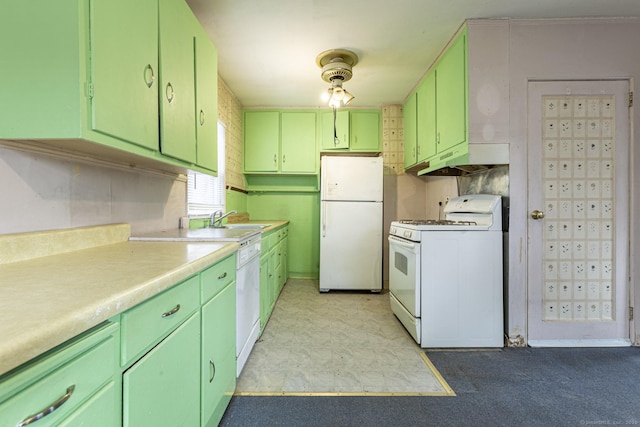 kitchen featuring under cabinet range hood, mail area, white appliances, and green cabinets