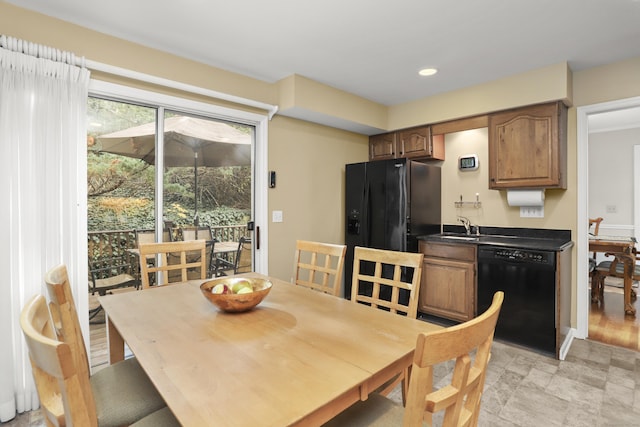 dining room featuring recessed lighting