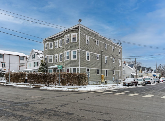 view of property with a residential view