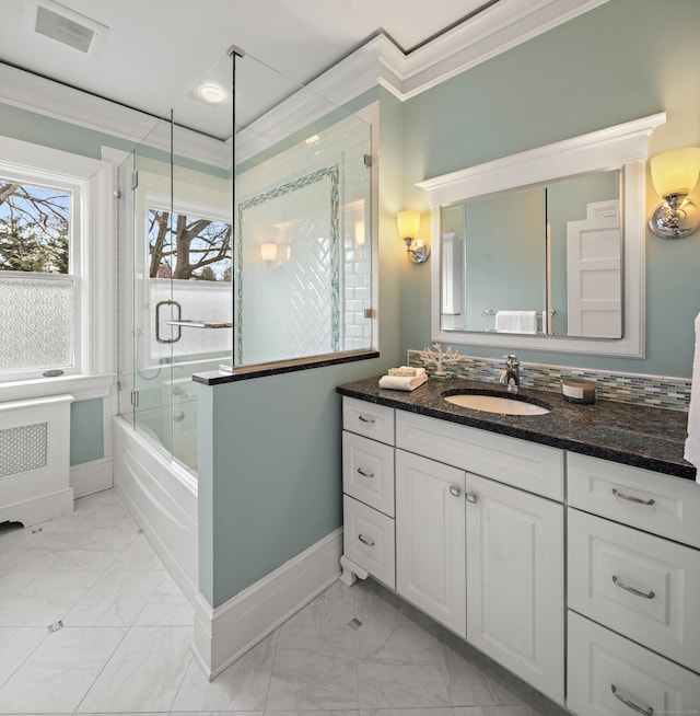 bathroom featuring visible vents, marble finish floor, and ornamental molding