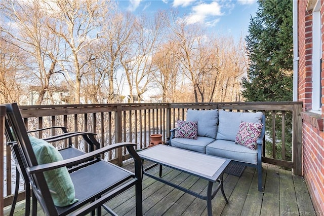 wooden deck with outdoor lounge area