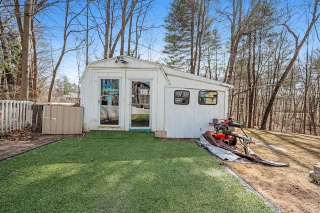 view of outdoor structure featuring an outdoor structure and fence