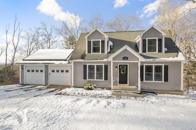 cape cod-style house with a garage and roof with shingles