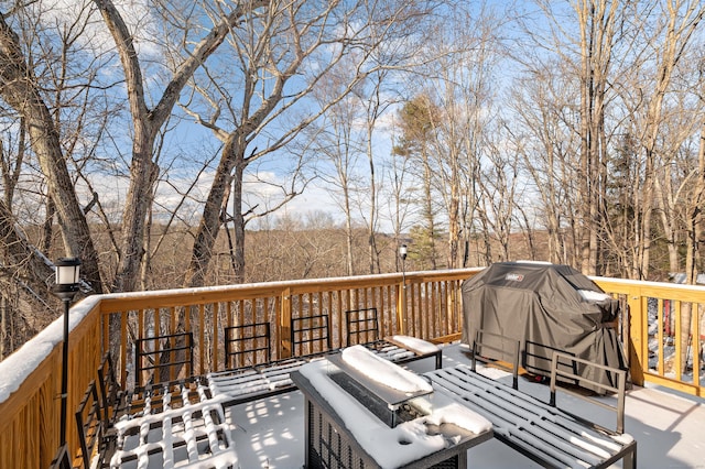 wooden deck featuring grilling area