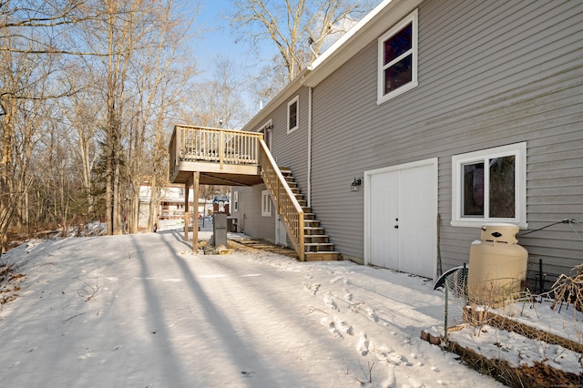 exterior space with stairway and a deck