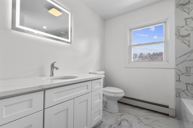 full bath with vanity, toilet, a bathtub, marble finish floor, and baseboard heating