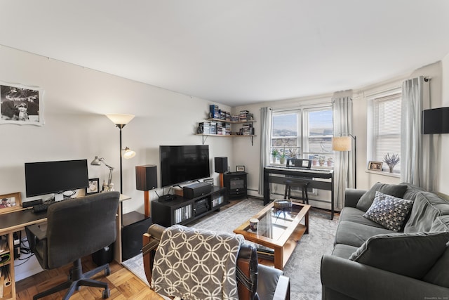 living room featuring a baseboard heating unit