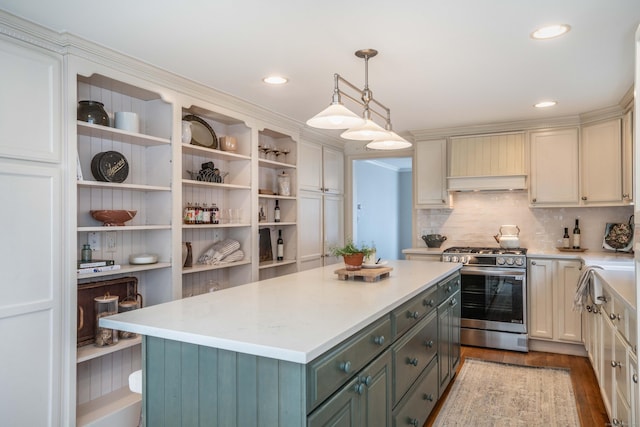 kitchen featuring stainless steel range with gas stovetop, gray cabinets, and light countertops