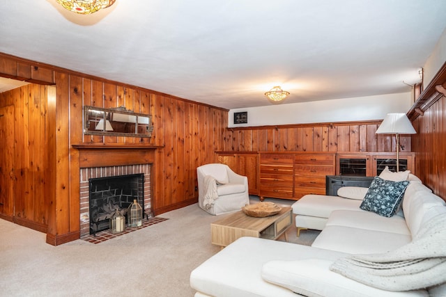 carpeted living room with wooden walls and a fireplace