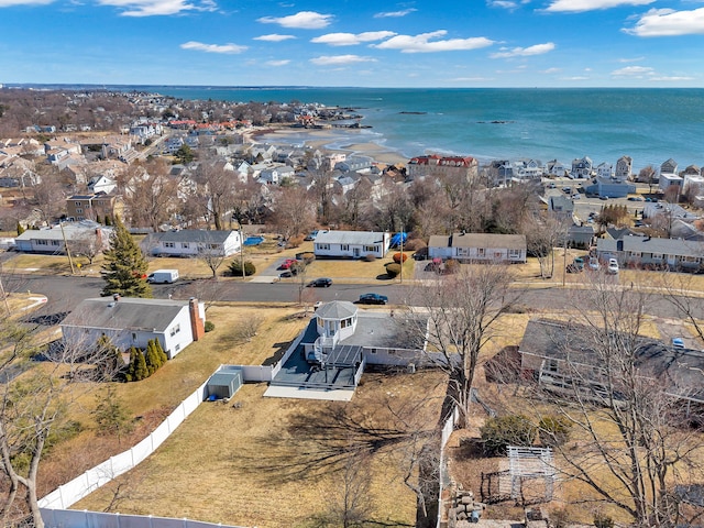 birds eye view of property with a residential view and a water view