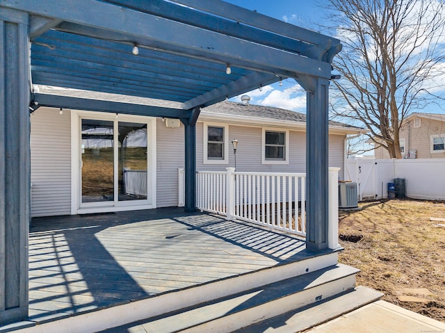 view of patio with central AC, a pergola, a deck, and fence