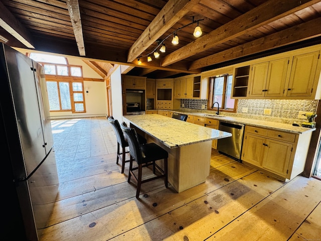 kitchen featuring tasteful backsplash, open shelves, beam ceiling, stainless steel appliances, and a sink