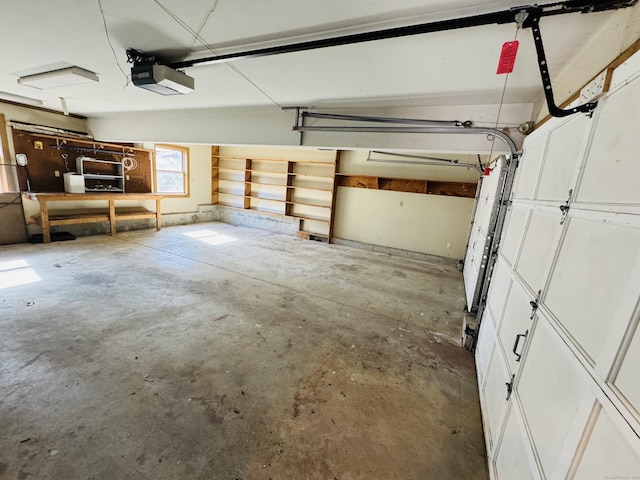 garage featuring a garage door opener