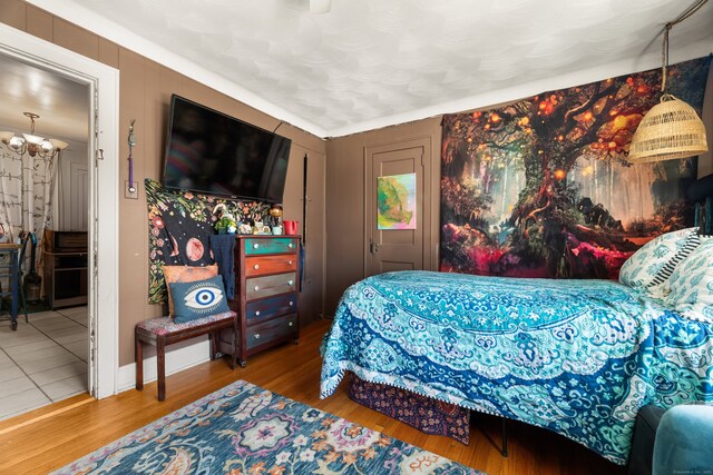 bedroom featuring wood finished floors