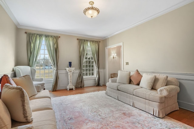 35 Grace View Dr, Easton, CT 06612 - living area with ornamental molding, plenty of natural light, wood finished floors, and wainscoting