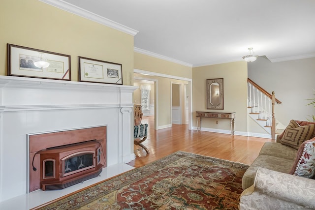 35 Grace View Dr, Easton, CT 06612 - living area with ornamental molding, stairway, wood finished floors, and a wood stove