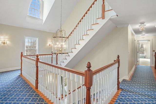 35 Grace View Dr, Easton, CT 06612 - stairs featuring carpet floors, a high ceiling, a chandelier, and crown molding