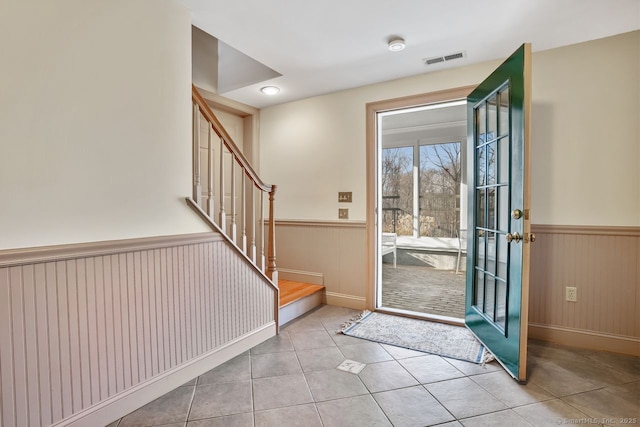 35 Grace View Dr, Easton, CT 06612 - tiled entrance foyer with wainscoting and stairway