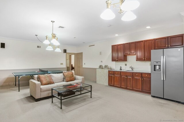 35 Grace View Dr, Easton, CT 06612 - living area featuring a chandelier, a wainscoted wall, crown molding, light carpet, and recessed lighting